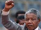 Mandela gives communist fist salute