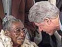 Clinton and old black woman