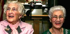 102-year-old Rose Morat and Solange Elizee, 87